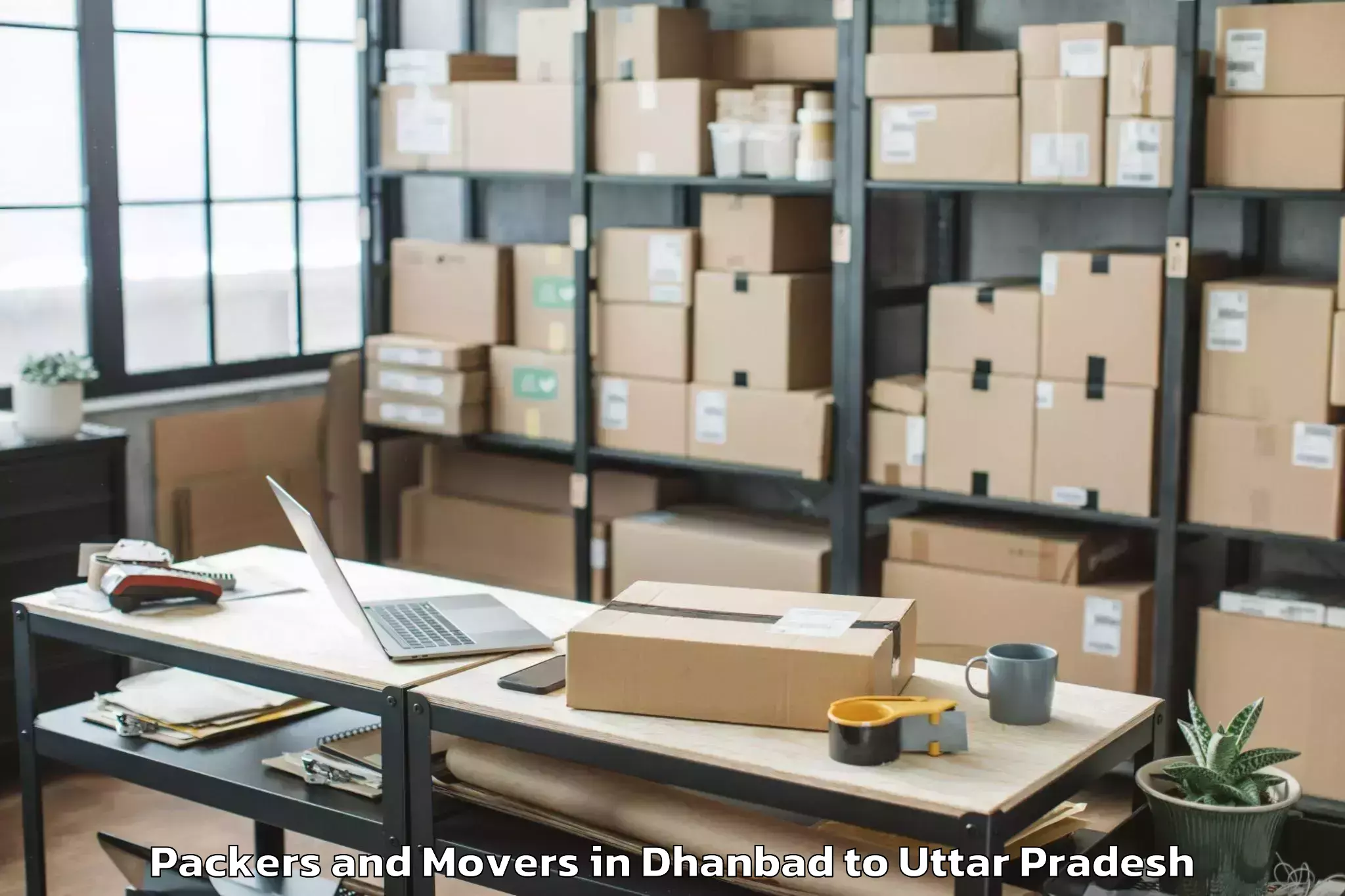 Reliable Dhanbad to Ramkola Packers And Movers